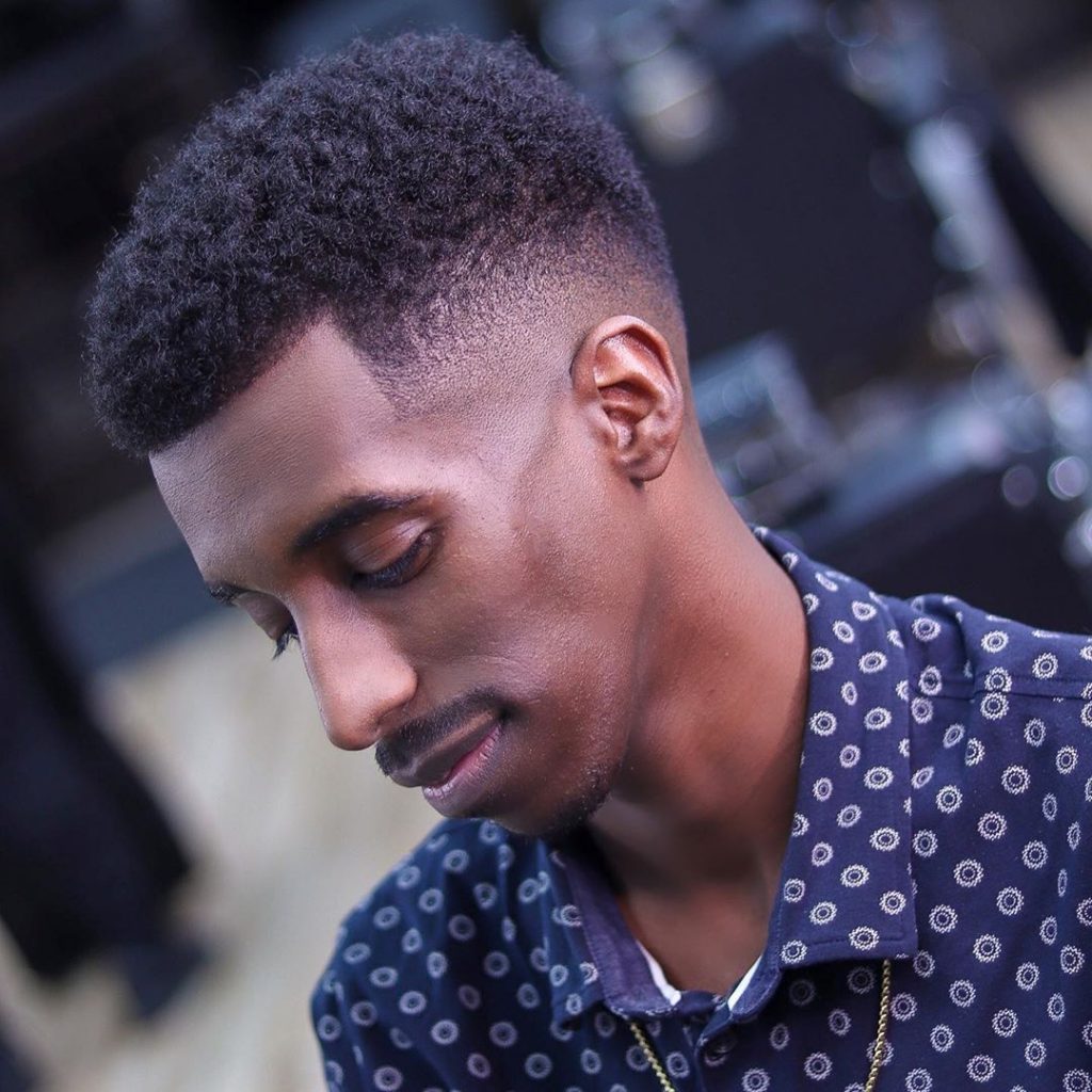 Drop fade haircut for Black men with curly hair