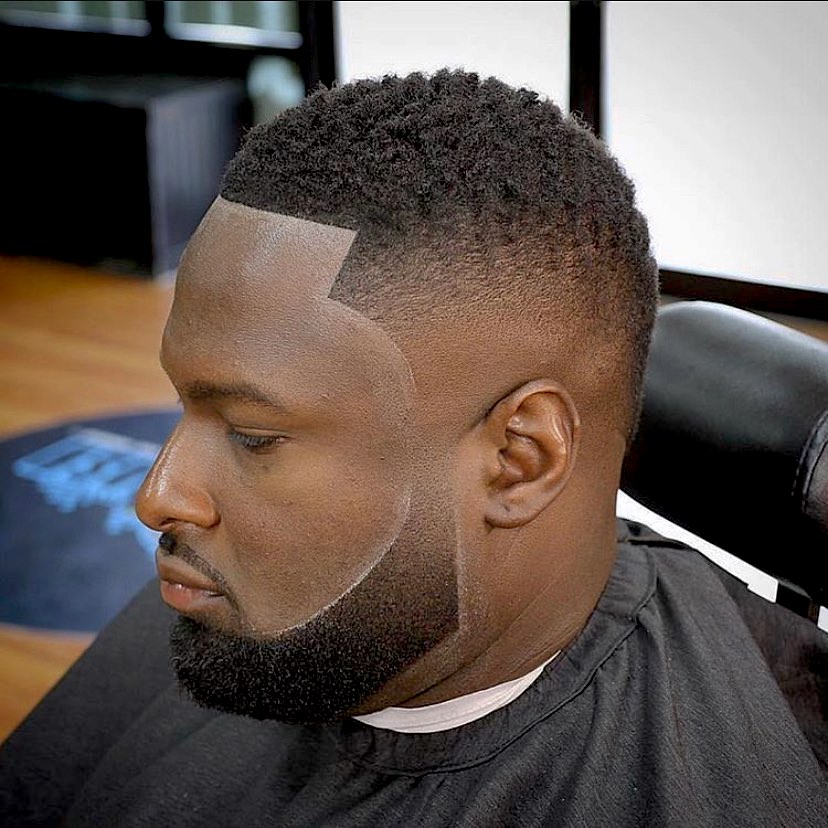Faded haircut for Black men with thin beard