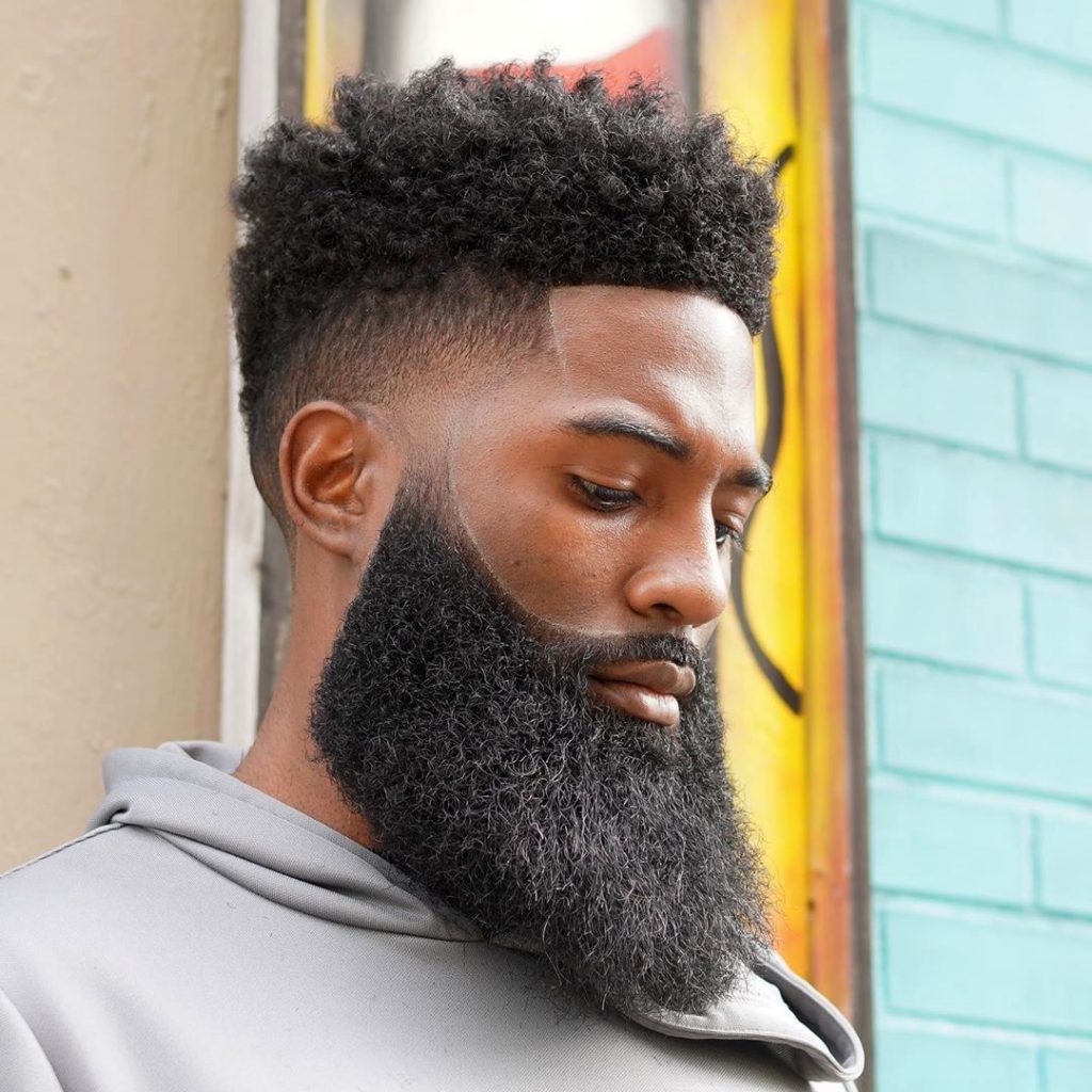Faded haircut for Black men with full beard