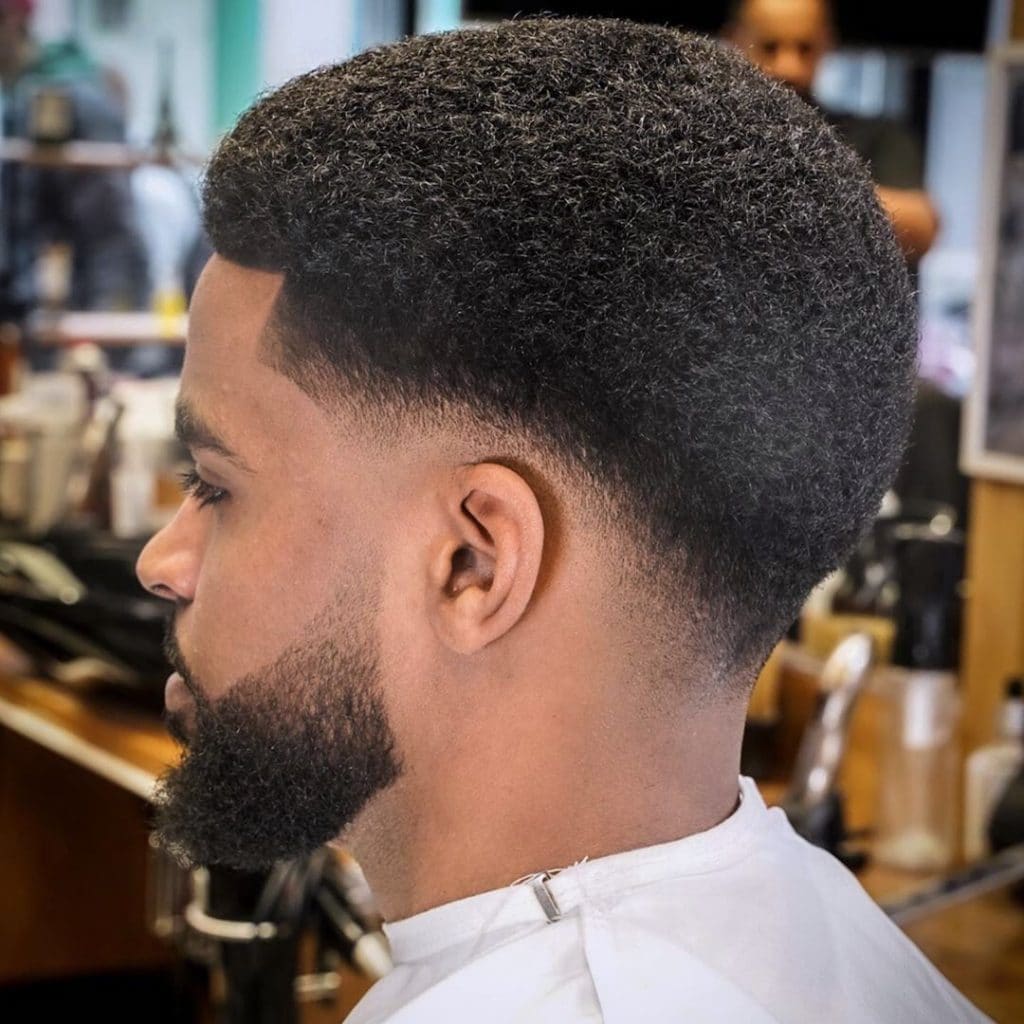 low fade haircut black men part
