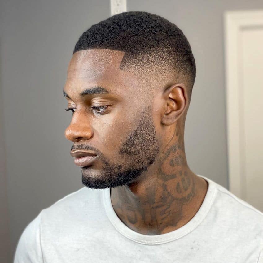 black haircut with 3 lines on side